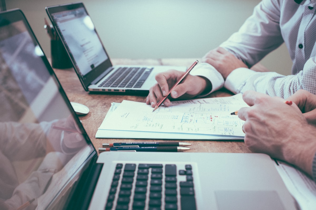 Strategist mapping a content calendar with keyword research notes